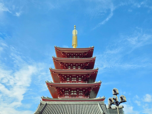 pexels-photo-33782187-33782187 A stunning view of the Senso-ji Temple pagoda against a vibrant blue sky in Tokyo, Japan.
