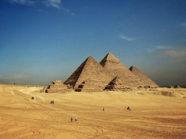 pexels-photo-34440031-34440031 Breathtaking image of the iconic Pyramids of Giza under a clear blue sky.